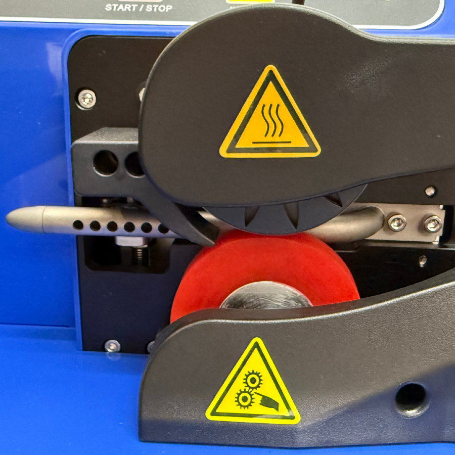 Close-up of a void fill machine showing the inflating head
